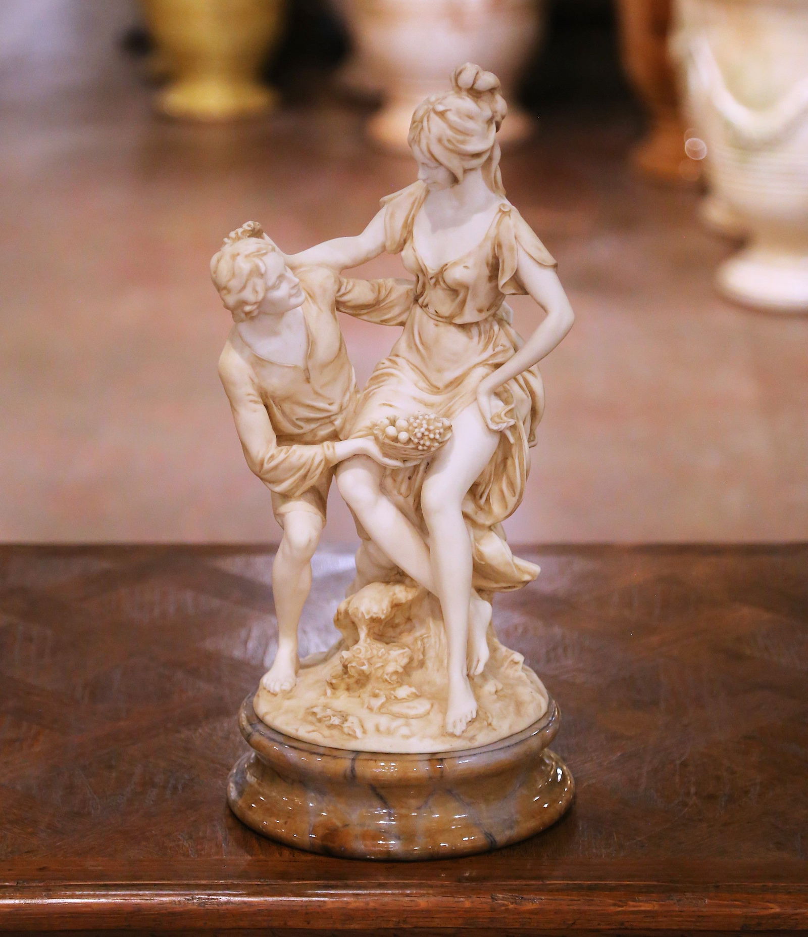 Italian Neoclassical Alabaster Couple Sculpture on Marble Base Mid-20th Century: Italian Neoclassical Alabaster Couple Sculpture on Marble Base Mid-20th Century This mid-century Italian Neoclassical sculpture features a finely hand-carved alabaster figural group, depicting a roman