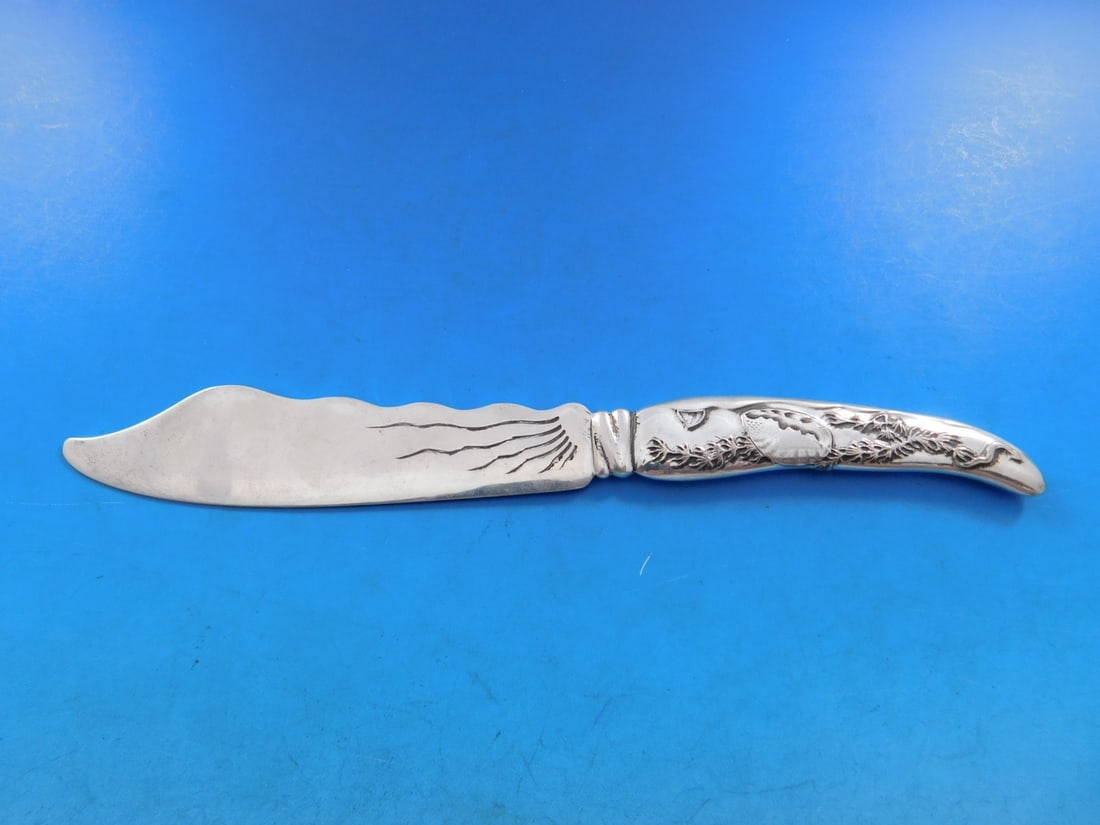 Tiffany & Co. Lap Over Edge Sterling Silver Fish Knife 7 7/8": Tiffany & Co. Lap Over Edge Sterling Silver Fish Knife 7 7/8" This exquisite fish knife features the elegant Lap Over Edge pattern by Tiffany & Co. Crafted from high-quality sterling silver, it showca