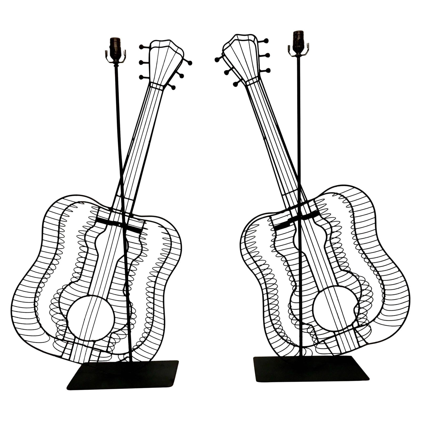 Set of 2 Mid-Century Modern Fredrick Weinberg Guitar Lamps: Set of 2 Mid-Century Modern Fredrick Weinberg Guitar Lamps This striking pair of Fredrick Weinberg style guitar lamps embodies the essence of Mid-Century Modern design. Made from durable iron and meta
