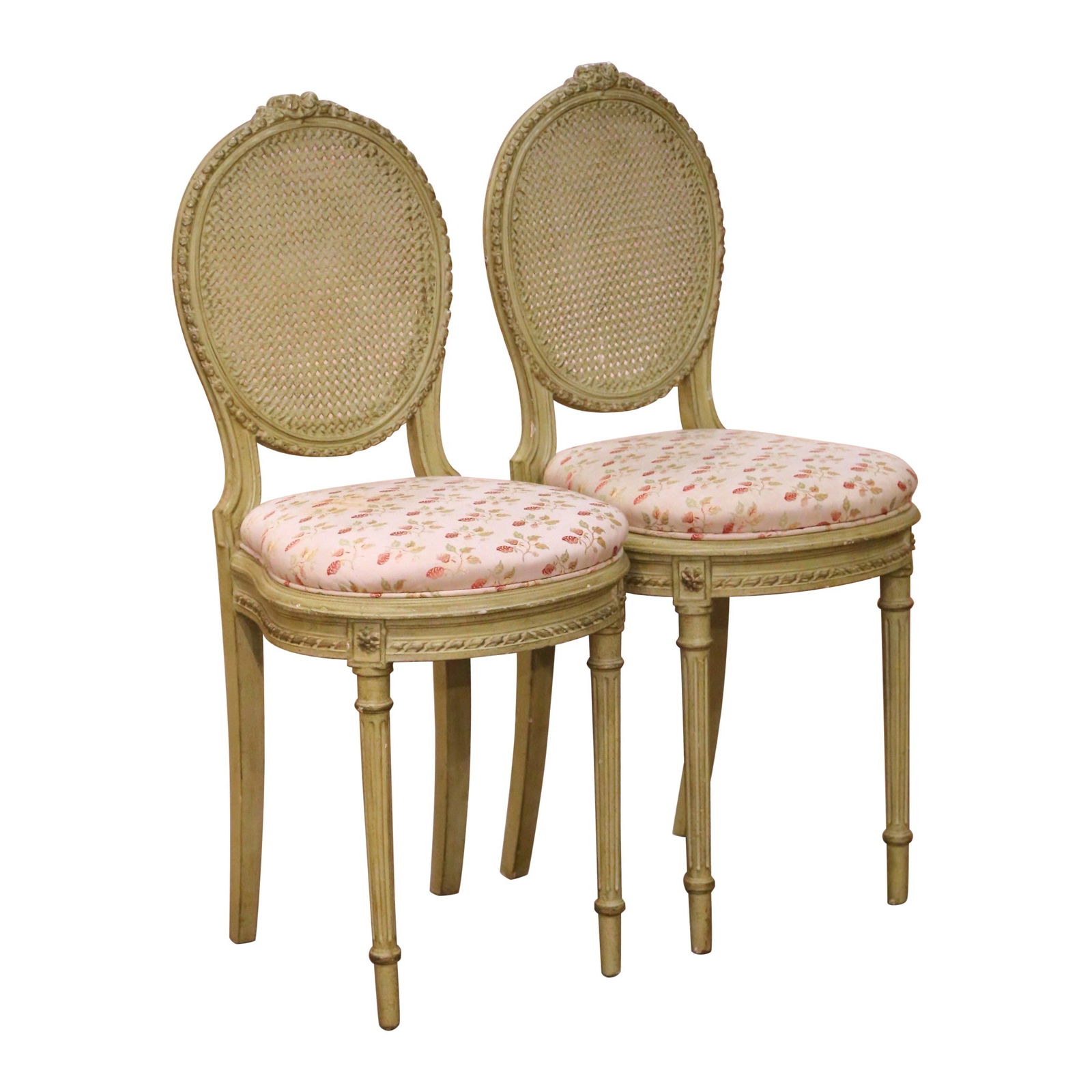 Set of 2 French Louis XVI Painted Beech and Cane Side Chairs circa 1920: Set of 2 French Louis XVI Painted Beech and Cane Side Chairs circa 1920 This elegant pair of early 20th-century French Louis XVI side chairs is crafted from hand-carved beech wood with a finely molded
