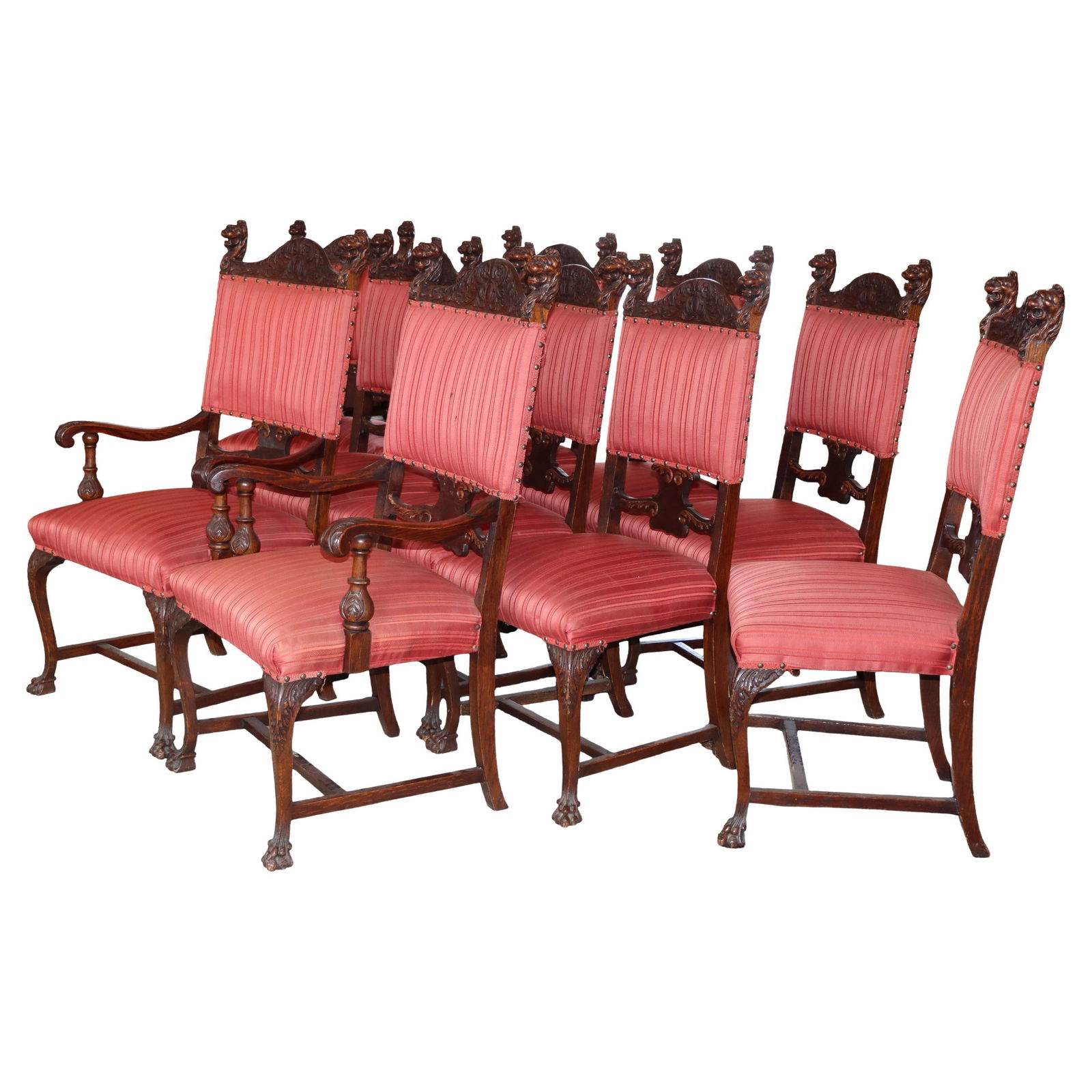 Set of 10 c1900 Oak Dining Chairs with Lion Carvings Attributed to RJ Horner: Set of 10 c1900 Oak Dining Chairs with Lion Carvings Attributed to RJ Horner This set of ten antique dining chairs, attributed to RJ Horner and dating to circa 1900, is crafted from oak. Each chair fe