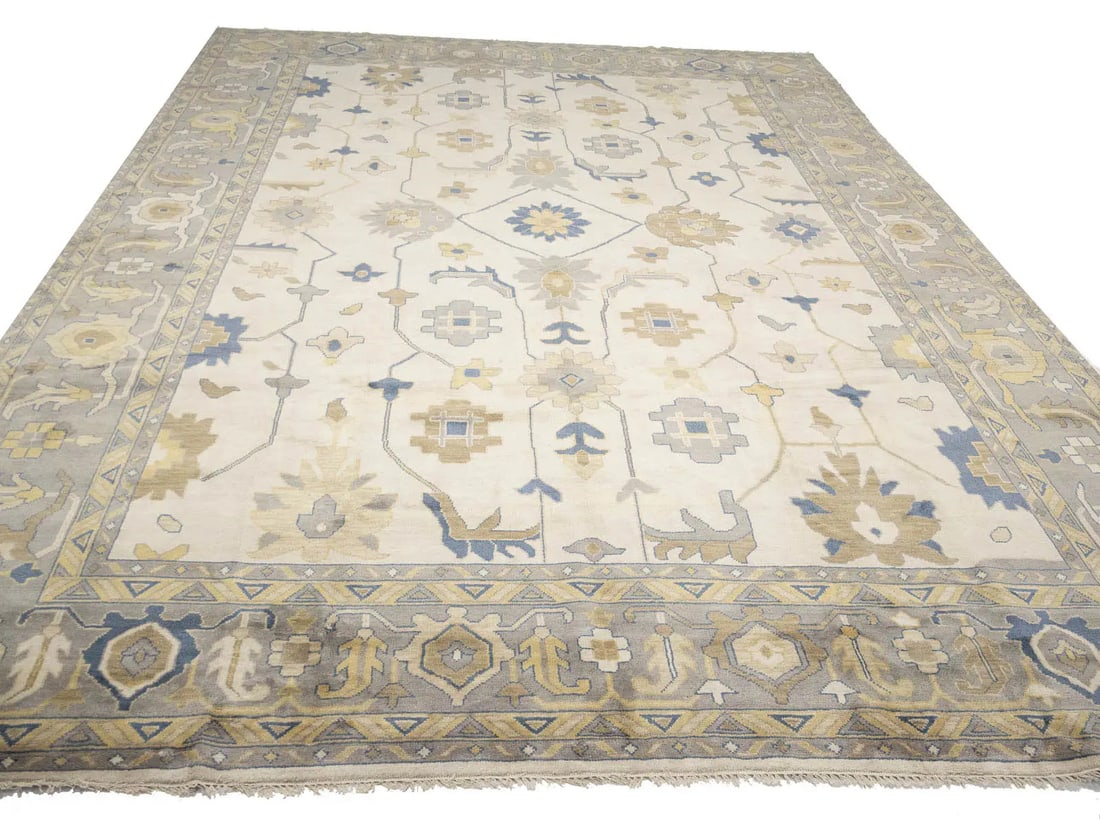 Large Hand-Knotted Wool Area Rug Floral Oushak Design 14x20 Feet: Large Hand-Knotted Wool Area Rug Floral Oushak Design 14x20 Feet This is a 14x20 foot hand-knotted Oushak oriental area rug featuring a floral pattern in muted tones of ivory, light gray, slate blue,