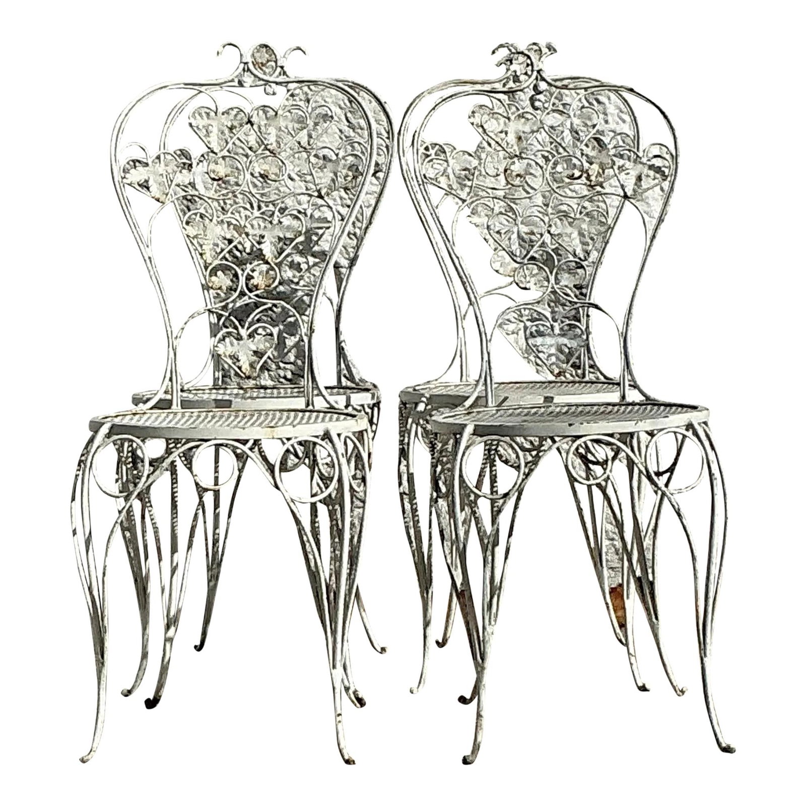 Set of 4 Vintage Boho Wrought Iron Strawberry Chairs: Set of 4 Vintage Boho Wrought Iron Strawberry Chairs Enhance your dining area with this charming set of four vintage boho wrought iron dining chairs, featuring delightful strawberry motifs. Crafted fr