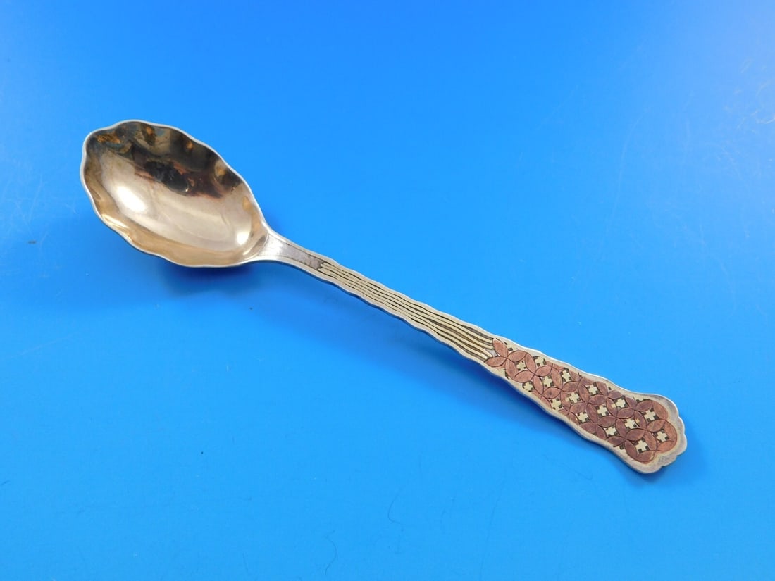 Tiffany & Co Lap Over Edge Sterling Silver Demitasse Spoon 4 3/8 Mixed Metals: Tiffany & Co Lap Over Edge Sterling Silver Demitasse Spoon 4 3/8 Mixed Metals This exquisite Tiffany & Co. demitasse spoon features the elegant Lap Over Edge pattern, crafted from high-quality sterlin