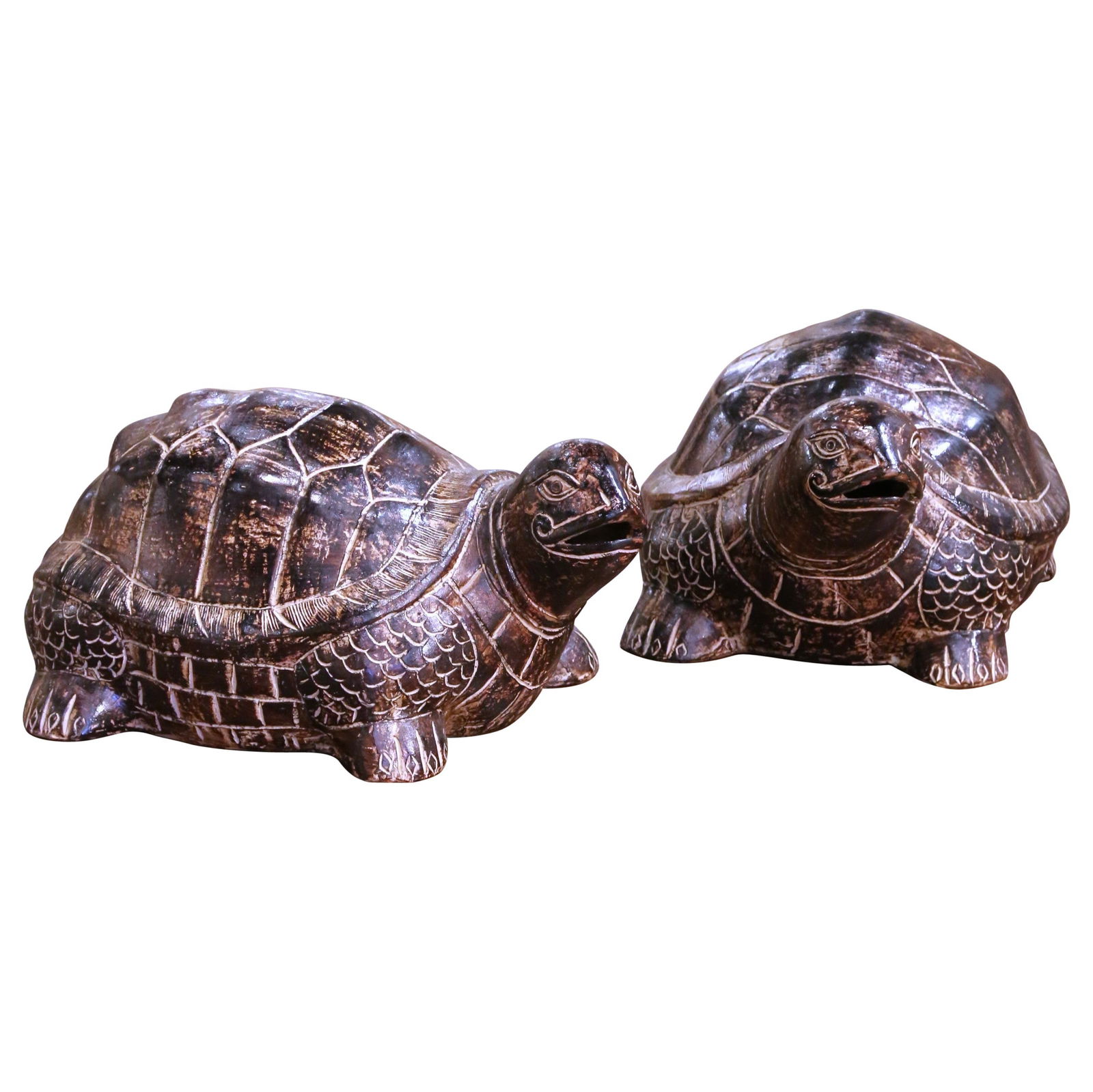 Set of 2 French Terracotta Turtle Sculptures with Aged Patina: Set of 2 French Terracotta Turtle Sculptures with Aged Patina Enhance your outdoor or indoor decor with this charming pair of French terracotta turtle sculptures. Crafted in France around 2010, these