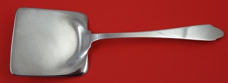 Tiffany & Co Clinton Sterling Silver 9 Inch Waffle Server: Tiffany & Co Clinton Sterling Silver 9 Inch Waffle Server This exquisite waffle server by Tiffany & Co. is crafted from sterling silver and features the elegant Clinton pattern. Measuring 9 inches, th