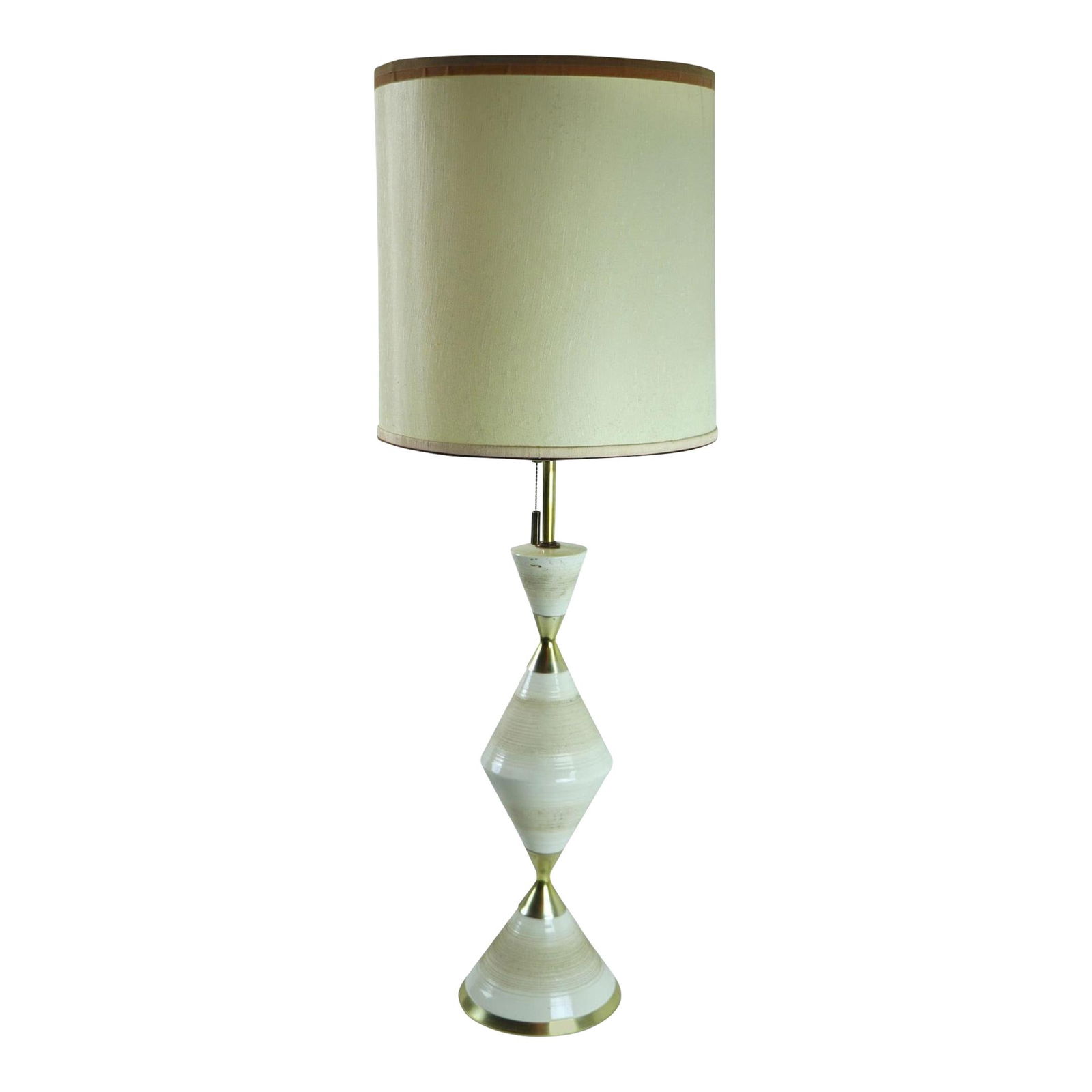 Midcentury Ceramic Brass Hourglass Table Lamp by Gerald Thurston: Midcentury Ceramic Brass Hourglass Table Lamp by Gerald Thurston This exquisite midcentury table lamp, designed by Gerald Thurston, features a unique hourglass form crafted from ceramic and brass. The