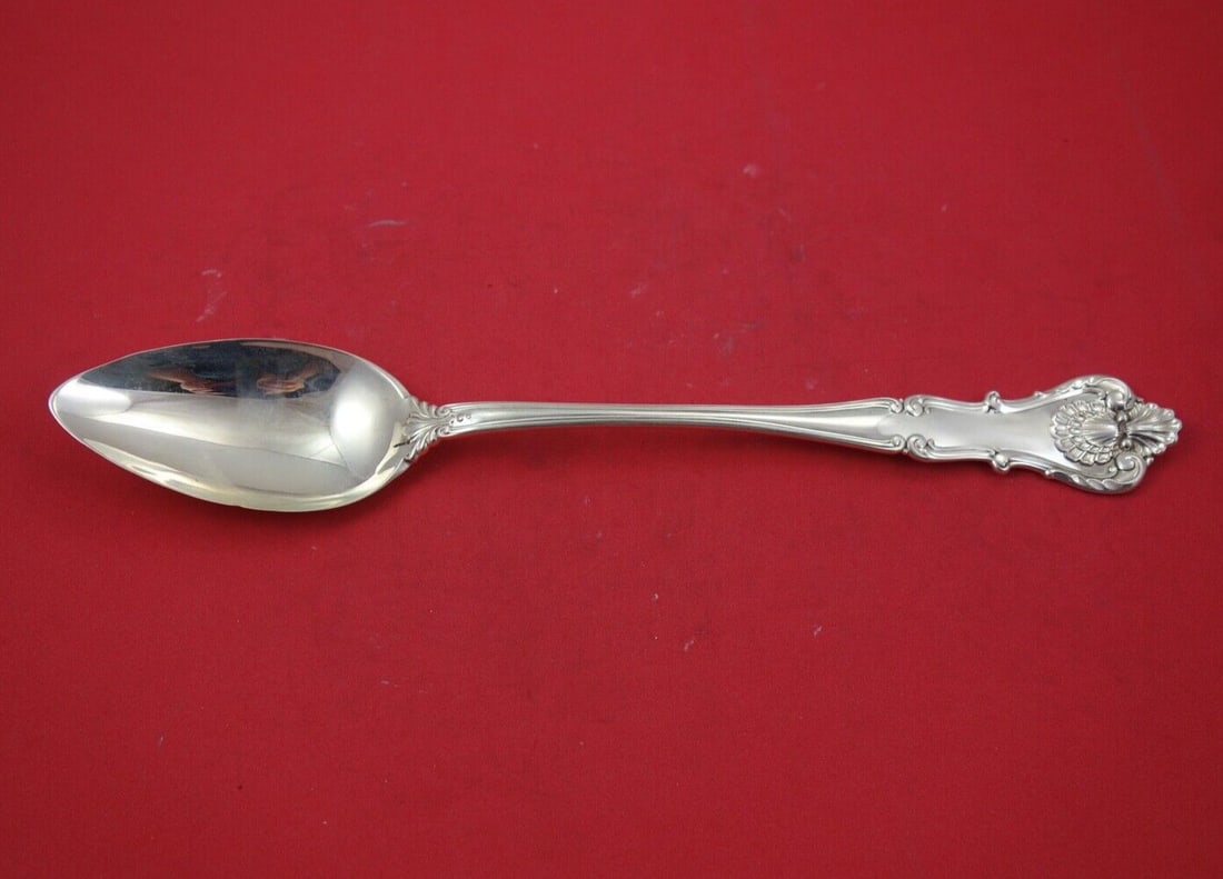 Durgin New Queens Sterling Silver Serving Spoon 11.5": Durgin New Queens Sterling Silver Serving Spoon 11.5" This exquisite serving spoon is crafted in sterling silver and features the elegant New Queens pattern by Durgin. Measuring 11 1/2 inches, this pl