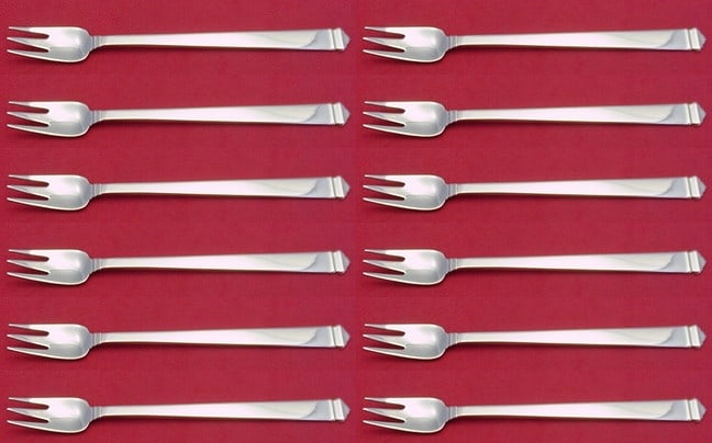 Tiffany & Co Hampton Sterling Silver Cocktail Fork Set 12 Pieces: Tiffany & Co Hampton Sterling Silver Cocktail Fork Set 12 Pieces This exquisite 12-piece cocktail fork set from Tiffany & Co. features the elegant Hampton pattern, crafted from high-quality sterling s