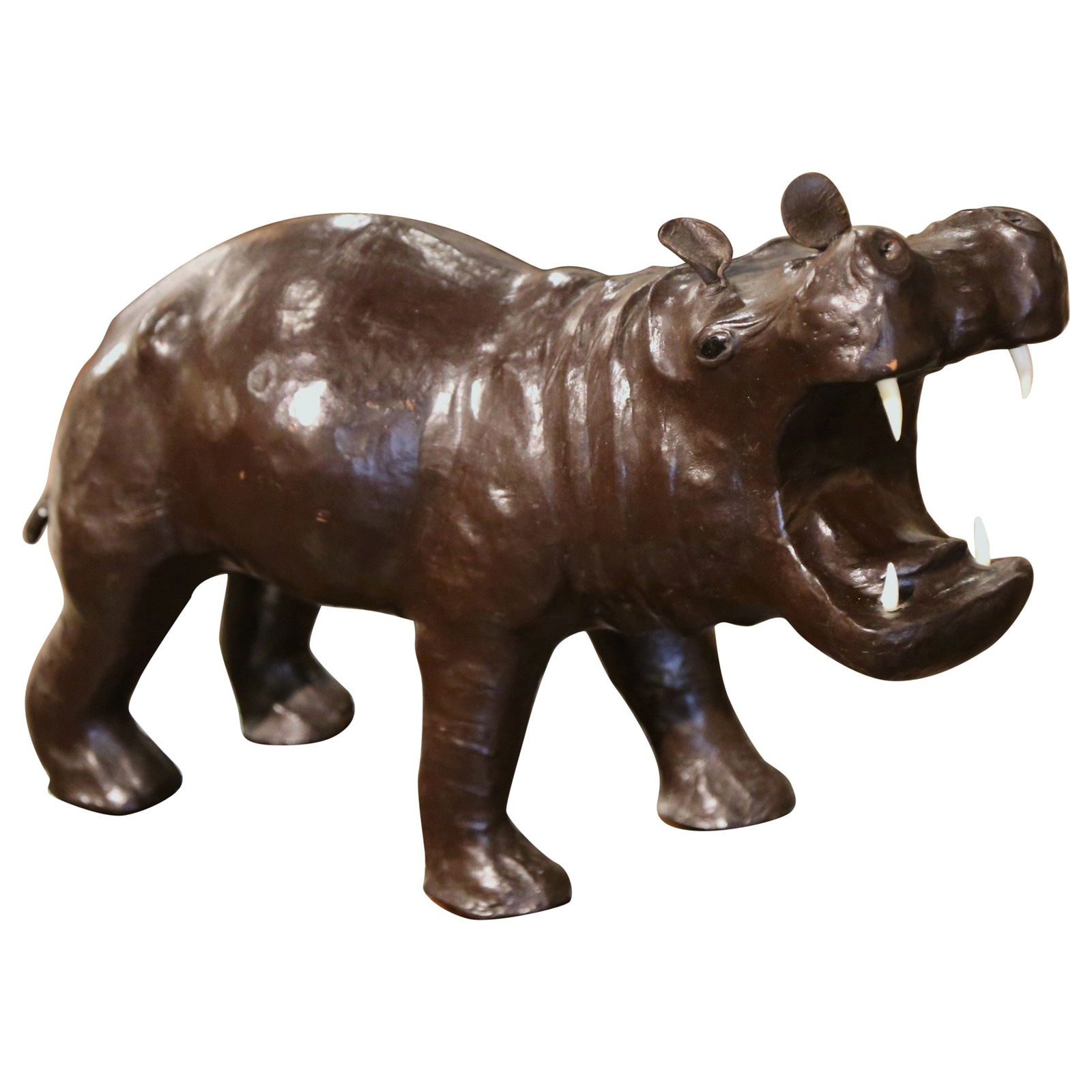 Antique Early 20th Century French Leather Hippo Sculpture: Antique Early 20th Century French Leather Hippo Sculpture This exquisite early 20th-century sculpture features a hand-crafted hippopotamus made from leather, showcasing intricate detailing and a rich,