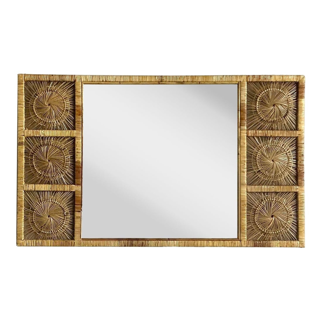 1970s Rattan Mirror With Six Sunburst Medallion Frame Bohemian Accent 60.25" Wide: 1970s Rattan Mirror With Six Sunburst Medallion Frame Bohemian Accent 60.25" Wide This vintage rattan sunburst mirror from the 1970s features a handcrafted frame with six distinctive sunburst medallio