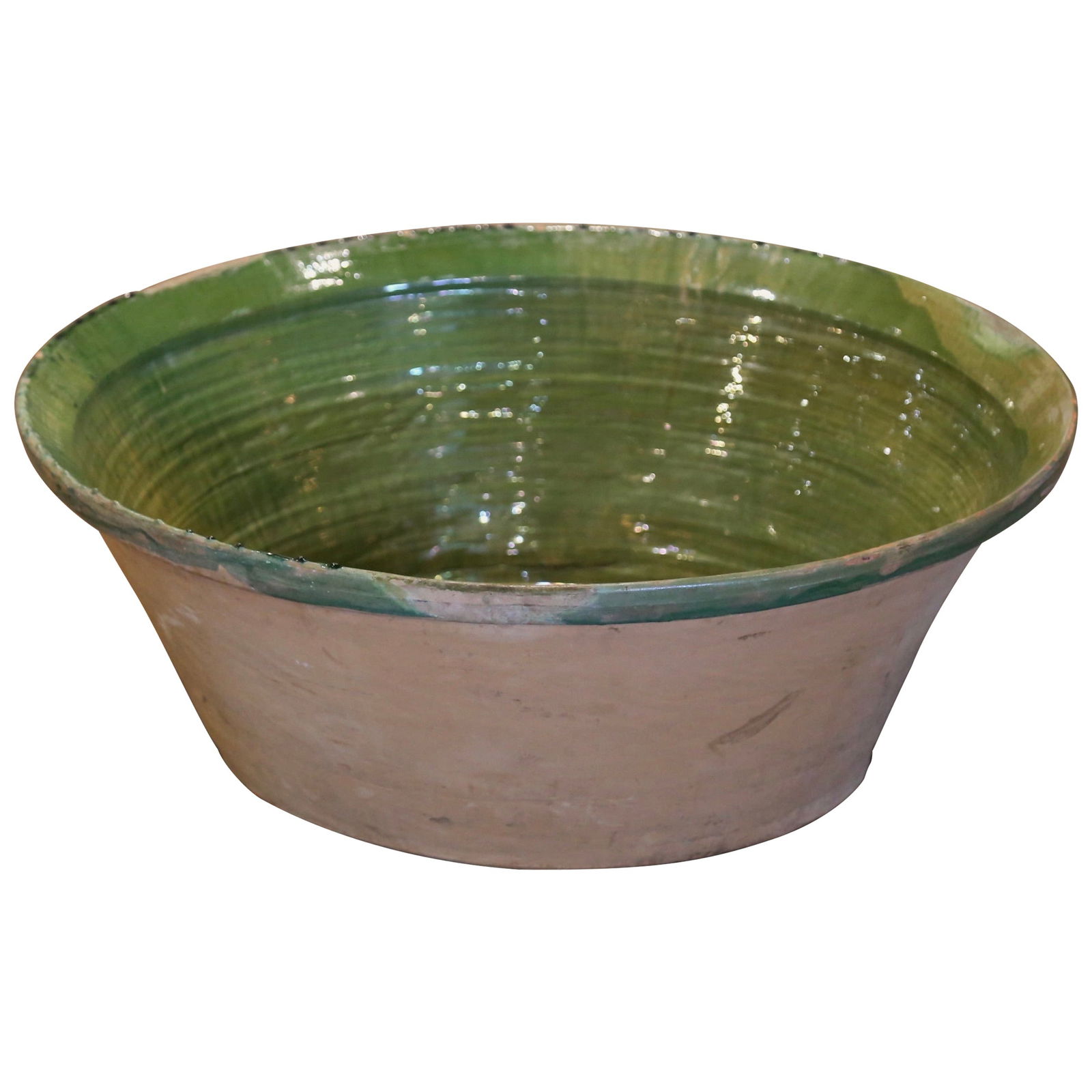 19th Century French Green Glazed Terracotta Tian Bowl Provence: 19th Century French Green Glazed Terracotta Tian Bowl Provence This stunning 19th Century French "Tian" bowl, originating from Provence, is a remarkable example of late 19th-century craftsmanship. Wit