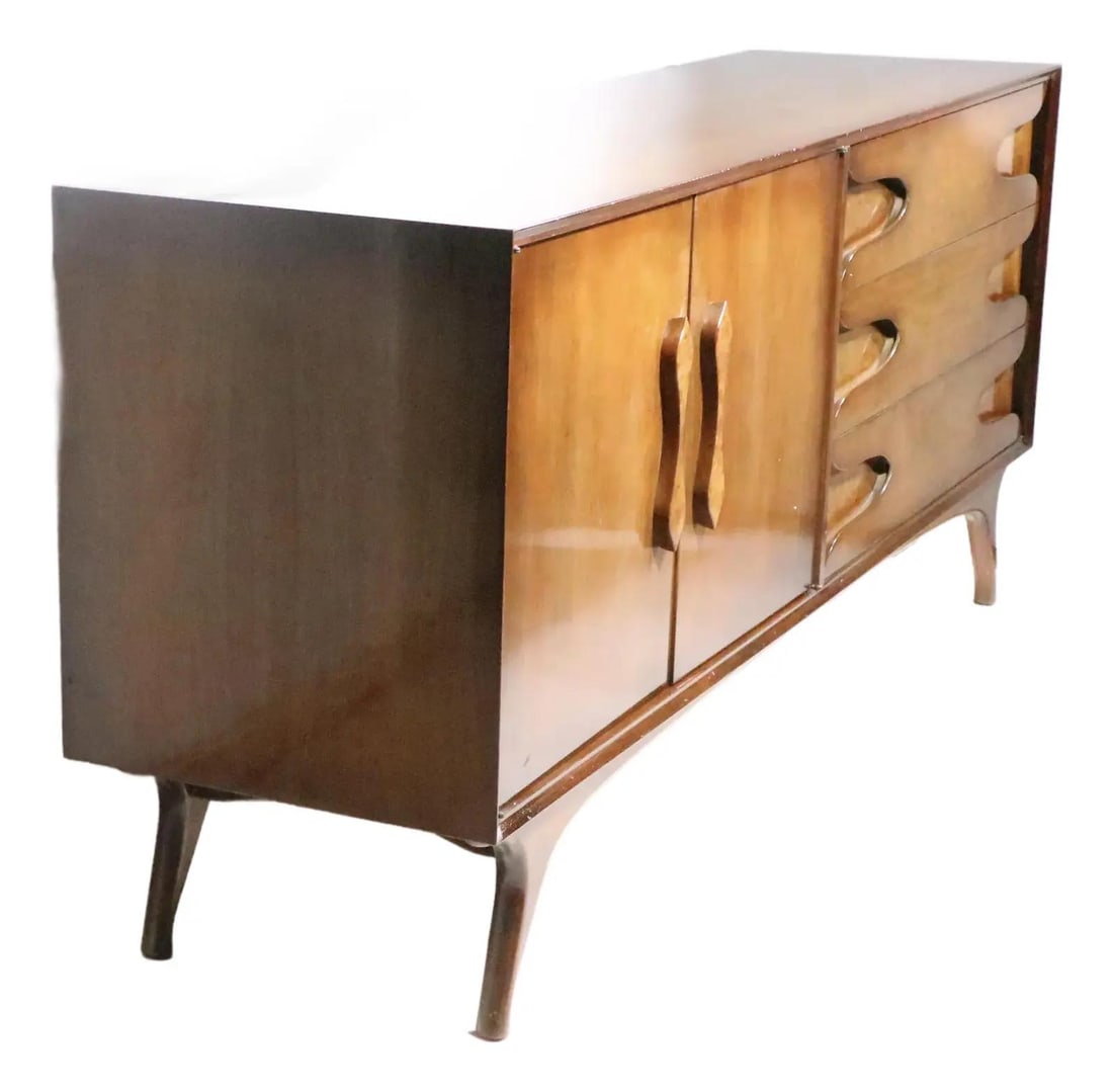 Walnut Mid Century Modern Dresser with Burl Accents and Sculpted Legs: Walnut Mid Century Modern Dresser with Burl Accents and Sculpted Legs This mid-century dresser features a walnut case with organic sculpted legs, burl fronted door pulls, and burl cut-out drawer pulls