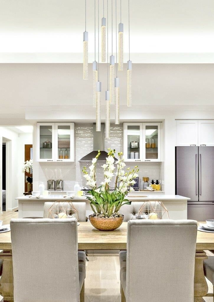 Weston 9-Light Chrome Crystal Chandelier Adjustable Indoor Pendant: Weston 9-Light Chrome Crystal Chandelier Adjustable Indoor Pendant Elevate your space with this stunning 9-light chandelier, featuring a modern design with a polished chrome finish and clear seeded cr