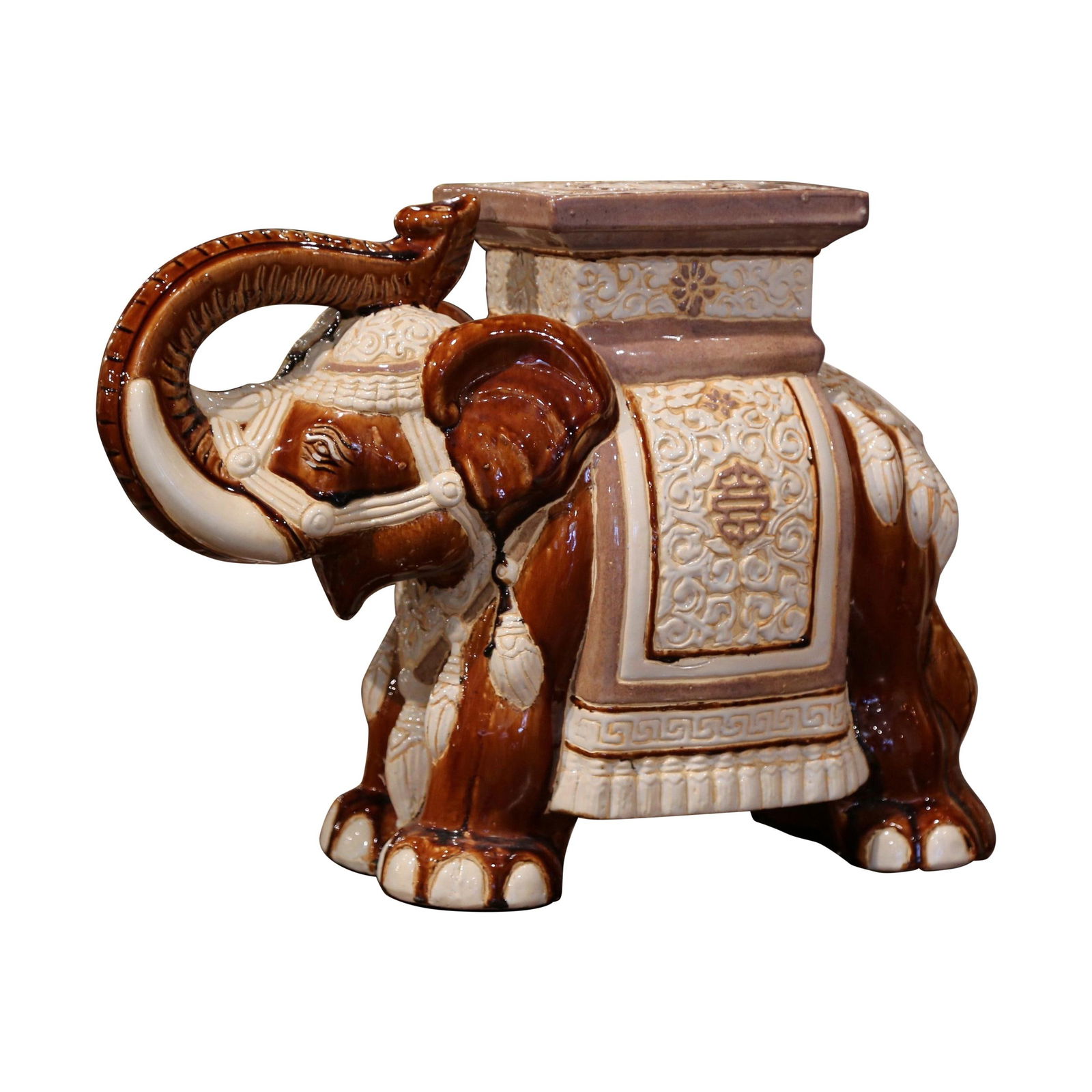 Hand Painted Faience Ceramic Elephant Garden Stool Circa 1960: Hand Painted Faience Ceramic Elephant Garden Stool Circa 1960 This vintage faience garden seat, crafted circa 1960, is shaped like an elephant with its trunk raised. Skillfully hand-painted in a brown