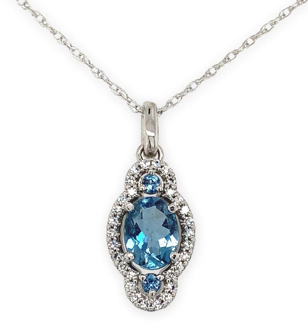 Platinum Aquamarine and Diamond Pendant Necklace GIA Certified: Platinum Aquamarine and Diamond Pendant Necklace GIA Certified This exquisite pendant necklace showcases a stunning combination of genuine natural aquamarine and sparkling diamonds set in luxurious pl