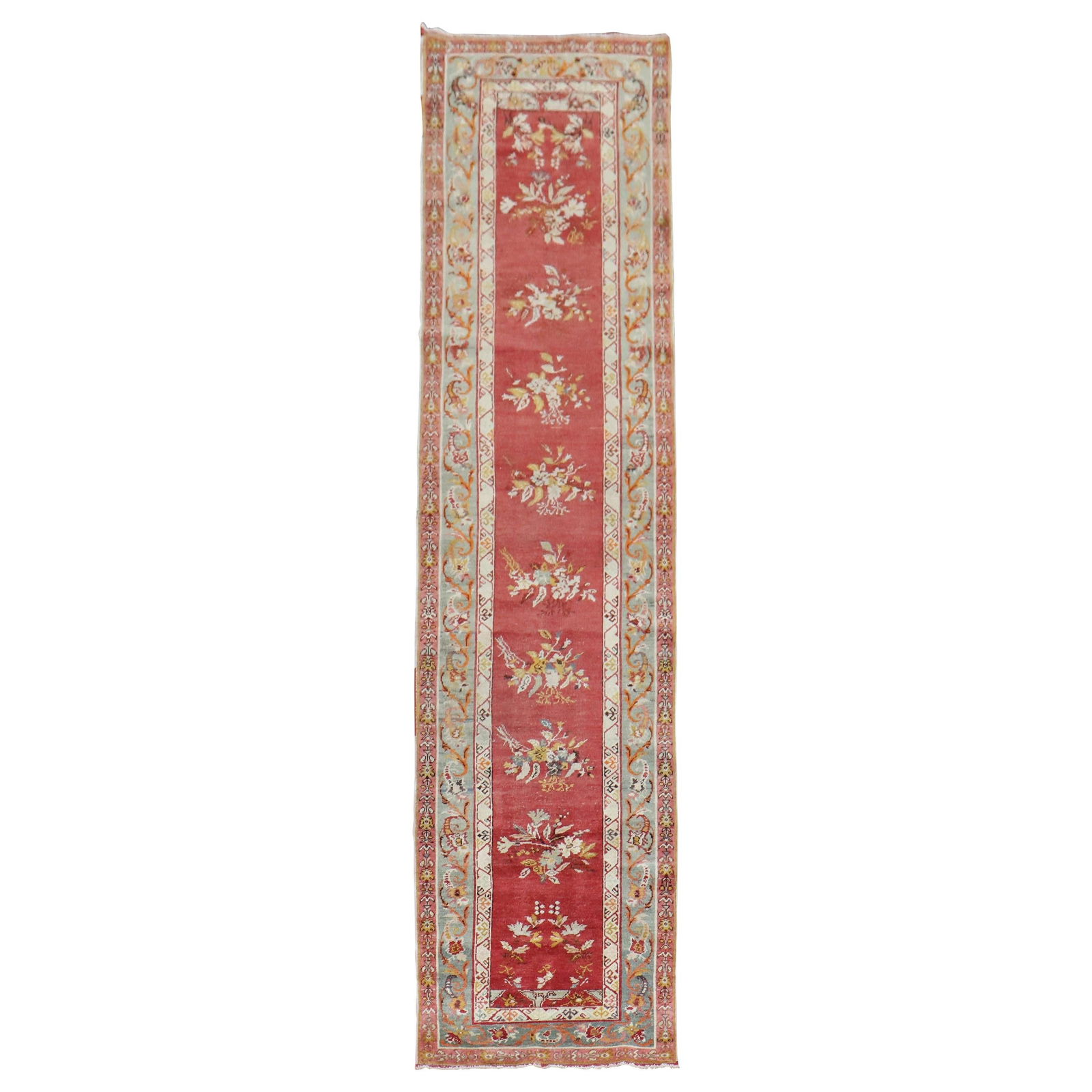 Mid-20th Century Hand-Knotted Red Floral Turkish Runner 33 x 138: Mid-20th Century Hand-Knotted Red Floral Turkish Runner 33 x 138 This exquisite early 20th-century Turkish runner features a romantic style characterized by its vibrant red field adorned with an all-o