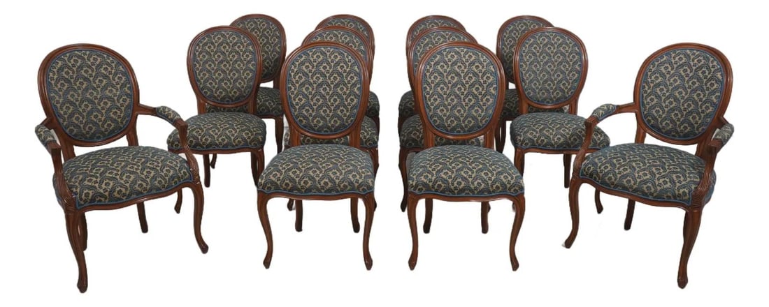 12 Walnut Medallion Back Dining Chairs in Louis XV Style with Blue Gold Upholstery Set of 12: 12 Walnut Medallion Back Dining Chairs in Louis XV Style with Blue Gold Upholstery Set of 12 This set includes 12 French Louis XV style dining chairs featuring classic medallion backs. Crafted with hi