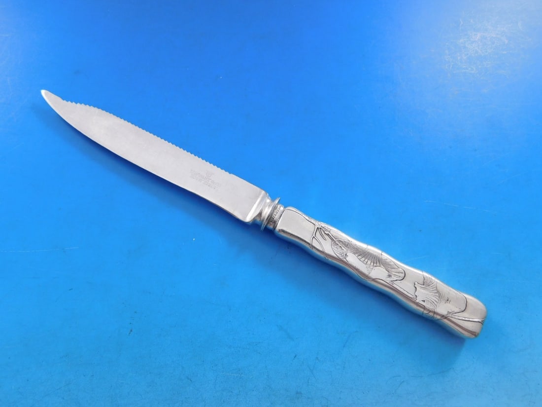 Tiffany & Co. Acid Etched Sterling Silver Fruit Knife Mushrooms 7.25": Tiffany & Co. Acid Etched Sterling Silver Fruit Knife Mushrooms 7.25" This exquisite fruit knife by Tiffany & Co. showcases the elegant Lap Over Edge pattern, featuring a charming mushroom motif. Craf