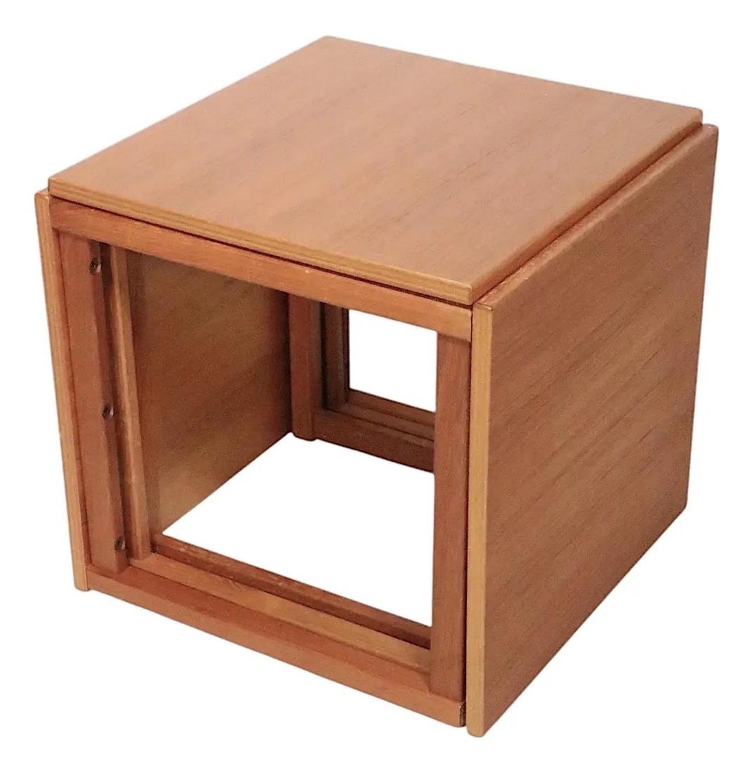 Danish Modern Teak Cube Nesting Tables by Kai Kristiansen 1960s: Danish Modern Teak Cube Nesting Tables by Kai Kristiansen 1960s Discover the elegance of Mid Century Danish Modern design with this iconic cube form nest of three teak tables, attributed to renowned d