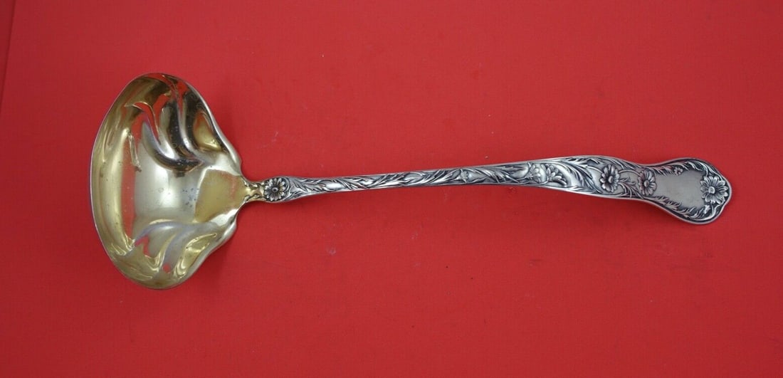 Gorham Marguerite Sterling Silver Soup Ladle Gold Washed 12 1/4 inch: Gorham Marguerite Sterling Silver Soup Ladle Gold Washed 12 1/4 inch Elevate your dining experience with this exquisite Marguerite soup ladle by Gorham. Crafted from sterling silver, this ladle featur