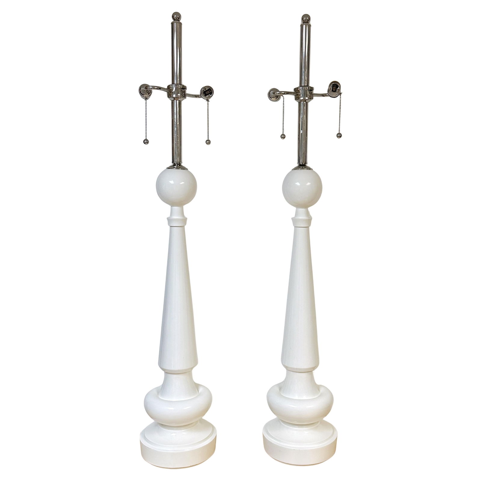 Set of 2 Tall White Lacquered Wood and Nickel Midcentury Sculptural Table Lamps: Set of 2 Tall White Lacquered Wood and Nickel Midcentury Sculptural Table Lamps This pair of monumental Mid-Century Modern table lamps features sculptural forms crafted from carved wood, finished in a