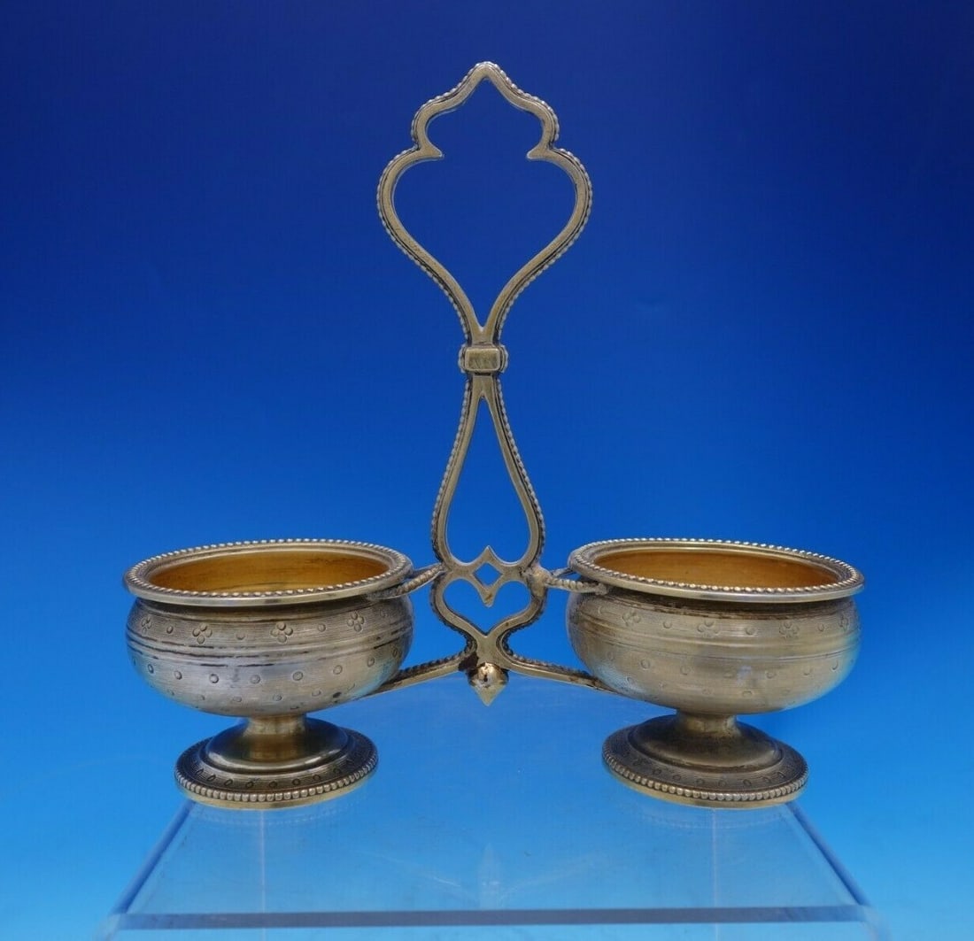 French .950 Silver Master Salt Caddy with Vermeil Bowls and Cast Handle: French .950 Silver Master Salt Caddy with Vermeil Bowls and Cast Handle This exquisite French .950 silver master salt caddy features a stunning design with two vermeil bowls and a beautifully crafted