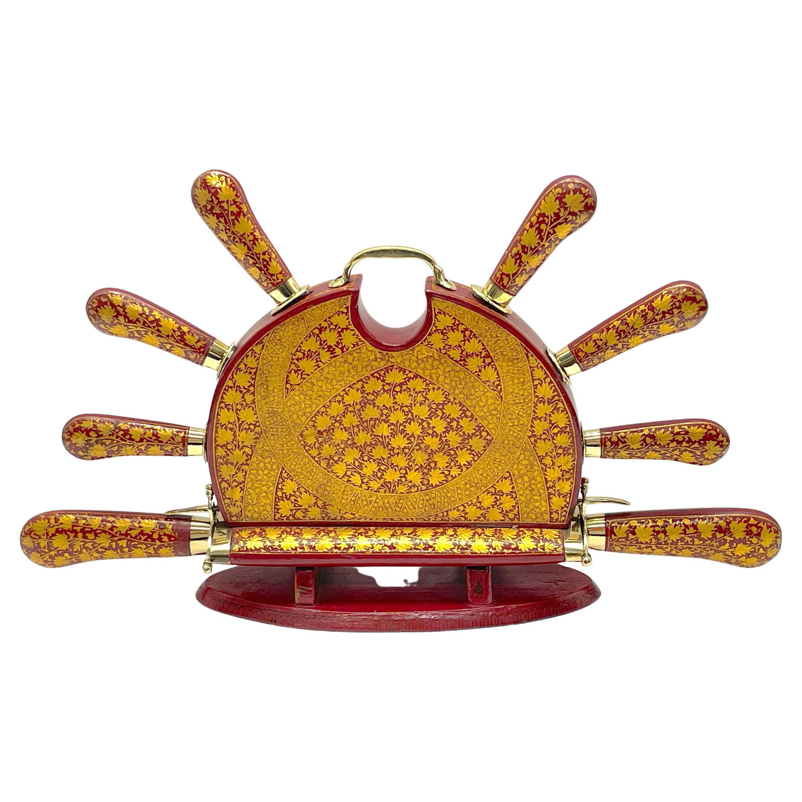 Mid-Century Anglo-Indian Red Lacquer Brass Carving Set 1950s: Mid-Century Anglo-Indian Red Lacquer Brass Carving Set 1950s This exquisite Anglo-Indian carving set showcases a rich red lacquer background adorned with intricate gilt leaf, vine, and trellis pattern