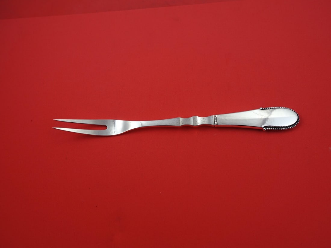 Georg Jensen Beaded Sterling Silver 2-Tine Meat Fork 9 3/8 Inches: Georg Jensen Beaded Sterling Silver 2-Tine Meat Fork 9 3/8 Inches This is a sterling silver meat fork by Georg Jensen featuring the Beaded pattern. It has two tines and a hollow handle, measuring 9 3/