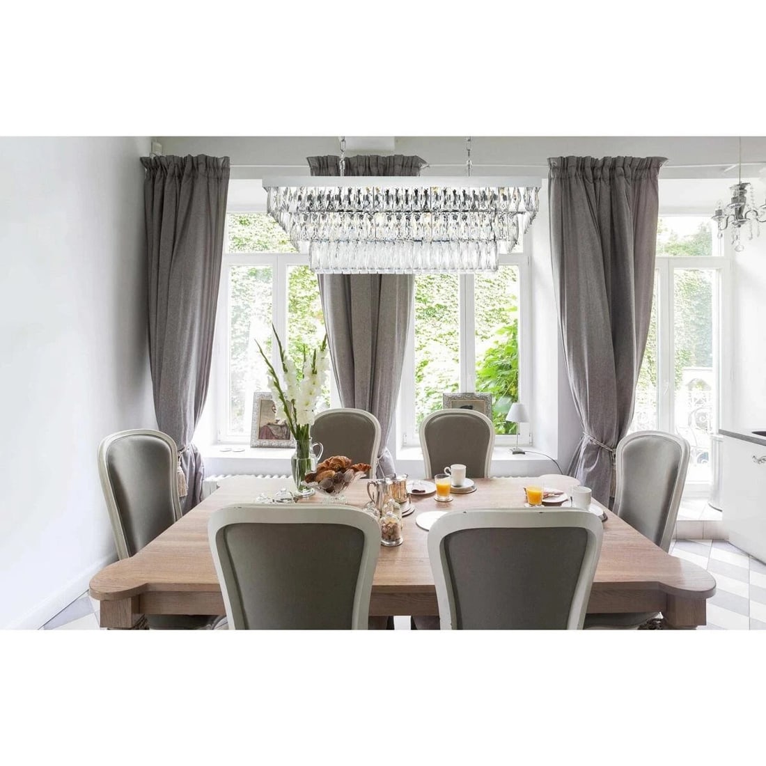 Josephine Chrome Crystal Chandelier 12-Light Modern Fixture 36 Inch Rectangular Design: Josephine Chrome Crystal Chandelier 12-Light Modern Fixture 36 Inch Rectangular Design This high-quality modern chandelier features a chrome-plated finish and is adorned with royal cut clear crystals.