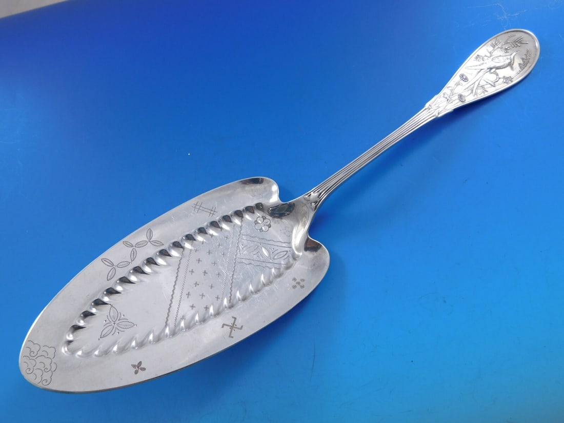 Tiffany & Co Japanese Sterling Silver Pie Server 10 3/4" with Bird Design: Tiffany & Co Japanese Sterling Silver Pie Server 10 3/4" with Bird Design This exquisite pie server from Tiffany & Co. exemplifies the elegance of the Japanese pattern. Crafted from sterling silver, t