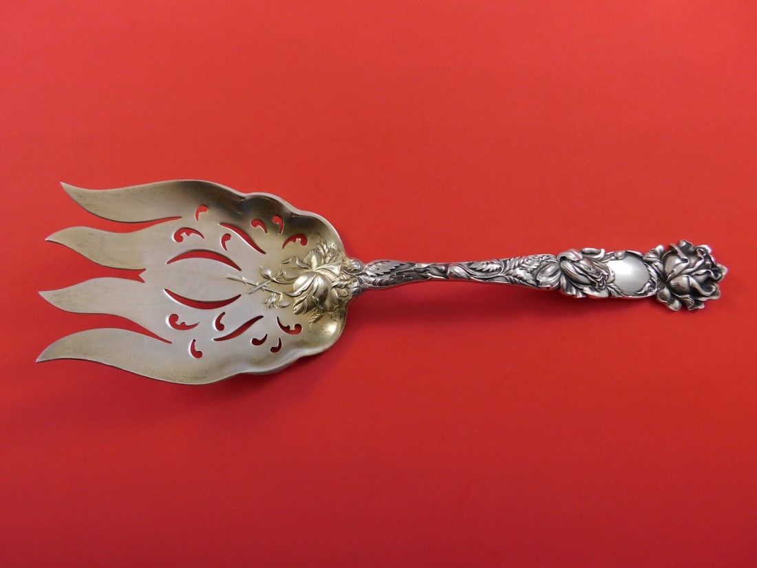 Alvin Bridal Rose Sterling Silver Goldwashed Fish Serving Fork 9 3/4": Alvin Bridal Rose Sterling Silver Goldwashed Fish Serving Fork 9 3/4" This exquisite fish serving fork is part of the Bridal Rose pattern by Alvin, crafted from high-quality sterling silver with a bea