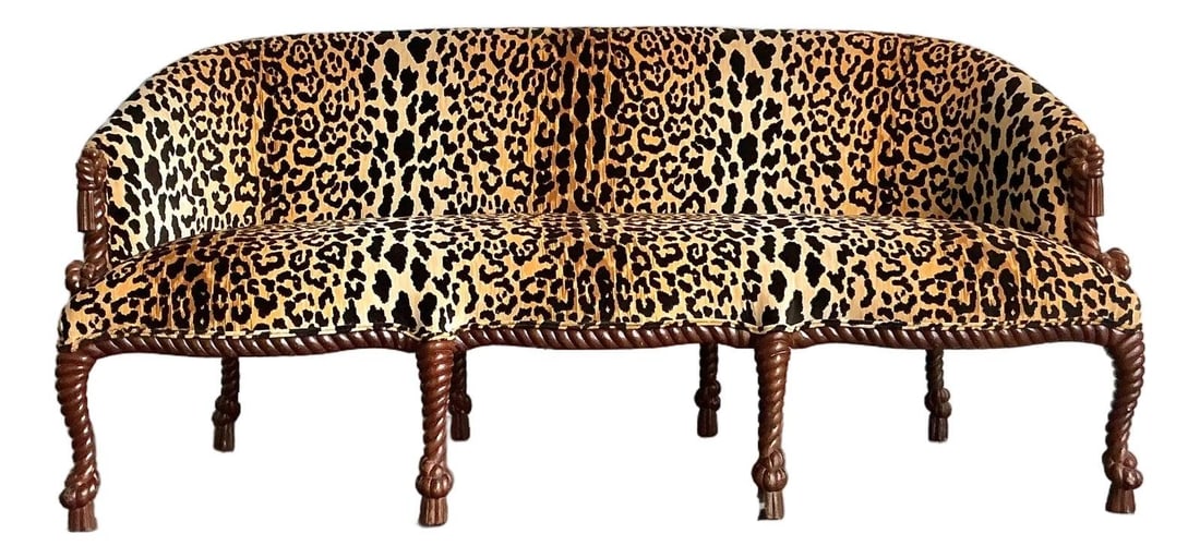Leopard Velvet Upholstered Sofa With Hand-Carved Rope Knot Frame: Leopard Velvet Upholstered Sofa With Hand-Carved Rope Knot Frame This vintage Hollywood Regency sofa features a luxurious leopard print velvet upholstery and a distinctive hand-carved wooden frame wit