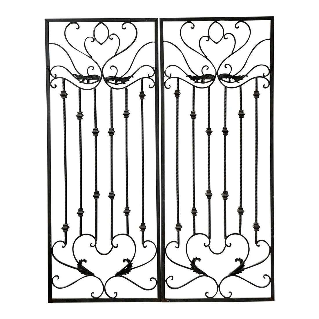 Pair of Hollywood Regency Style Wrought Iron Decorative Panels: Pair of Hollywood Regency Style Wrought Iron Decorative Panels This pair of vintage wrought iron panels exemplifies the luxurious Hollywood Regency style, blended with traditional European filigree. E