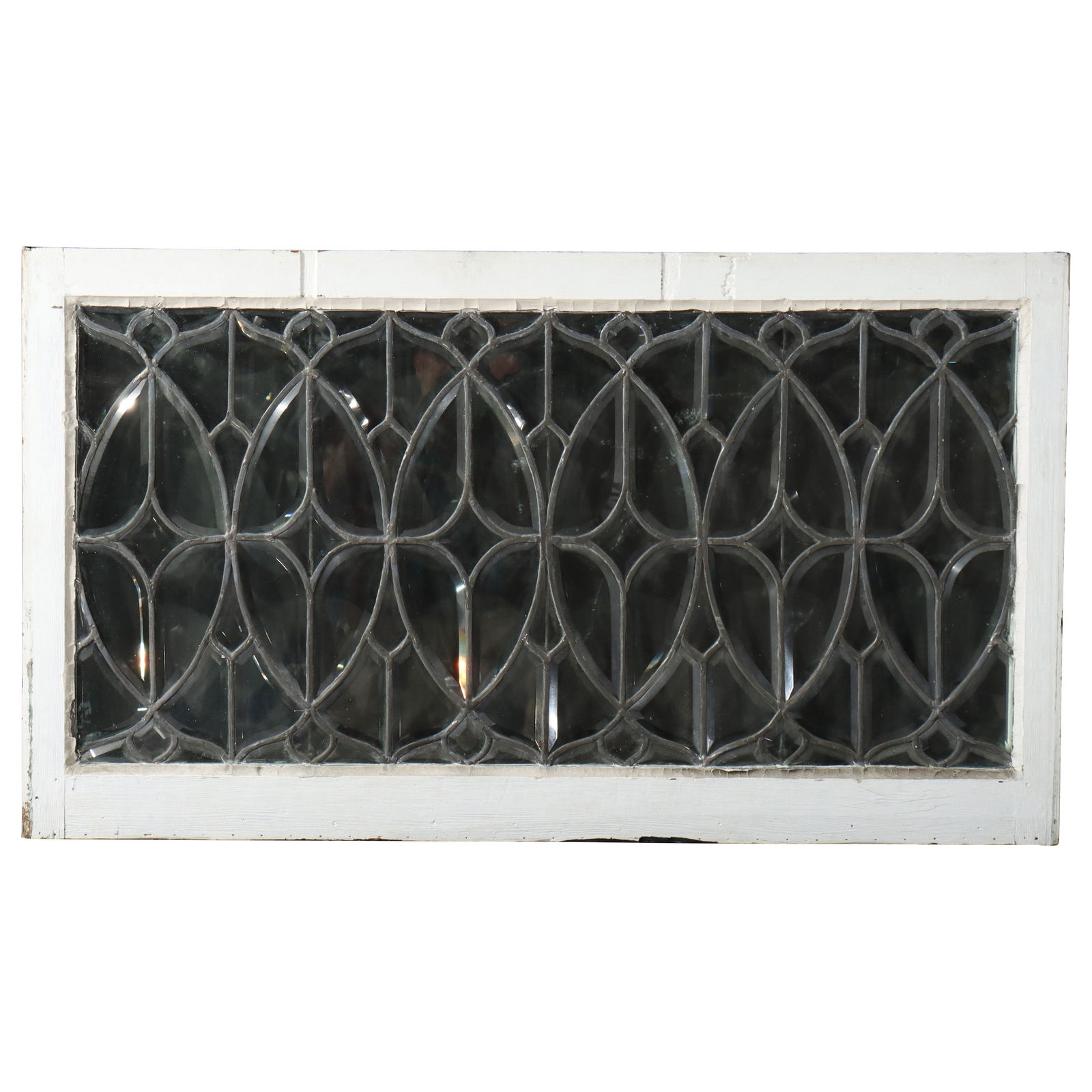 1920 Antique Arts & Crafts Beveled Glass Window 25x43.75: 1920 Antique Arts & Crafts Beveled Glass Window 25x43.75 This exquisite antique Arts & Crafts beveled leaded glass window, dating from around 1920, showcases intricate craftsmanship typical of the per