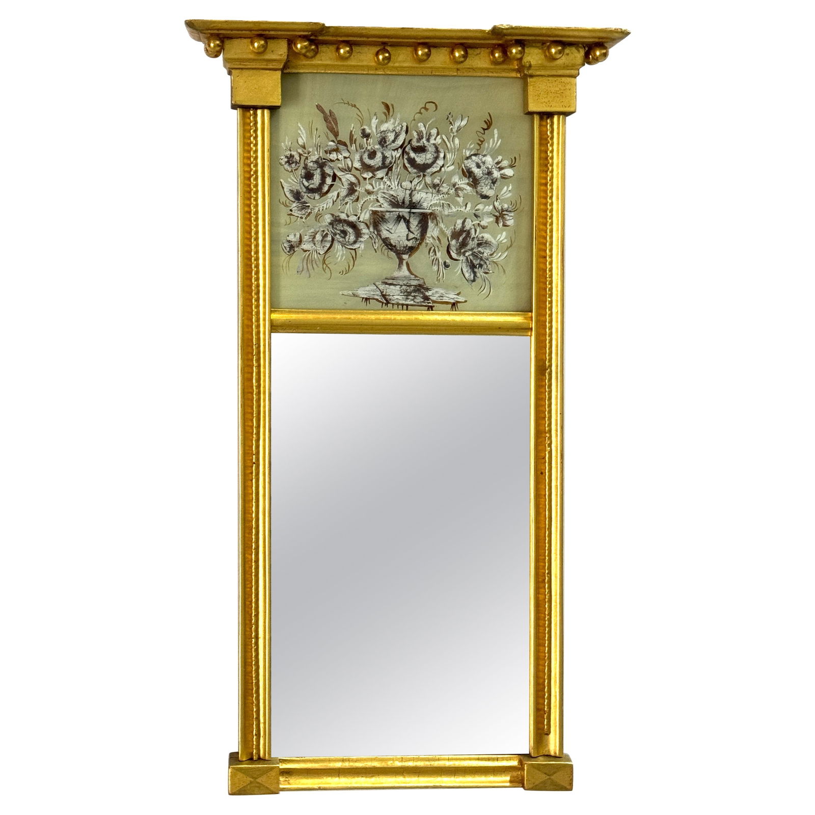 Rare American Federal Trapezoidal Pier Mirror by Doggett, Circa 1815: Rare American Federal Trapezoidal Pier Mirror by Doggett, Circa 1815 This American Federal Eglomise and Giltwood Trapezoidal Pier Mirror, attributed to John Doggett, is an exquisite example of early 1