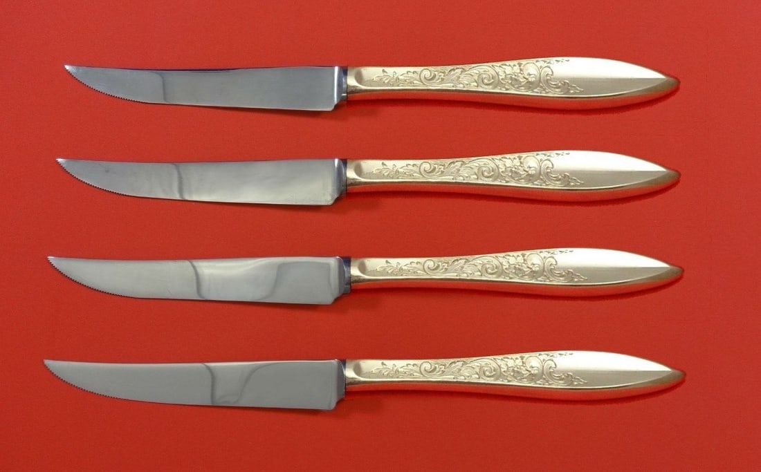 Gorham White Paisley Sterling Silver Steak Knife Set 4pc Custom 8.5": Gorham White Paisley Sterling Silver Steak Knife Set 4pc Custom 8.5" This exquisite 4-piece steak knife set features the elegant White Paisley pattern by Gorham. Crafted with sterling silver hollow ha