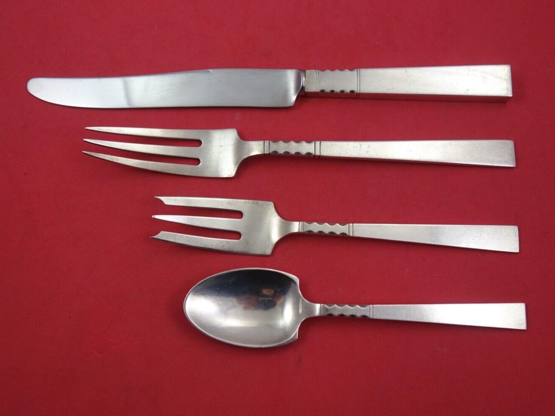 John Petterson Neptune Sterling Silver 4-Piece Dinner Set: John Petterson Neptune Sterling Silver 4-Piece Dinner Set This exquisite 4-piece dinner setting in the Neptune pattern by John Petterson is crafted from high-quality sterling silver. The set includes