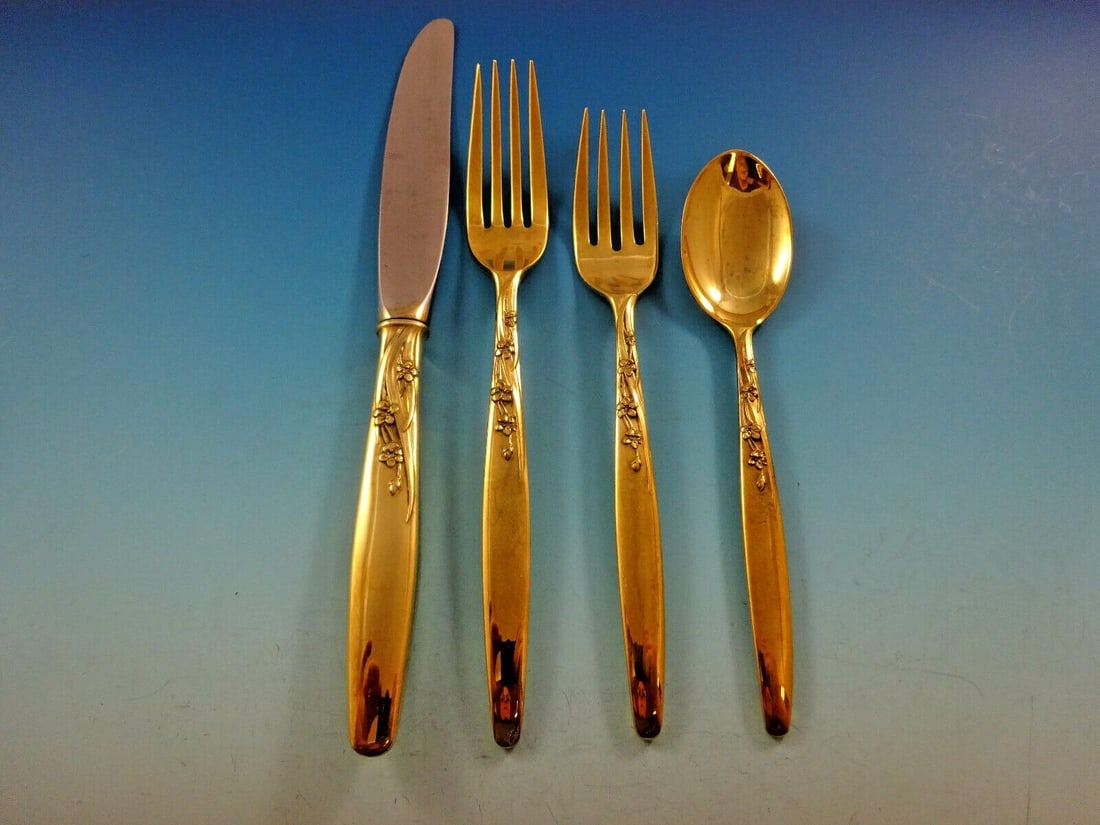 Lunt Summer Song Vermeil 4pc Sterling Silver Place Setting: Lunt Summer Song Vermeil 4pc Sterling Silver Place Setting Elevate your dining experience with this exquisite 4-piece place setting from the Summer Song Vermeil collection by Lunt. Crafted from