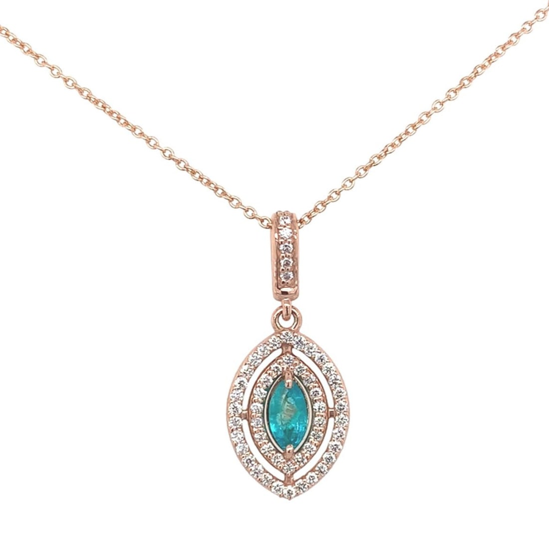14k Rose Gold Halo Pendant with .20ct Paraiba Tourmaline and Diamonds: 14k Rose Gold Halo Pendant with .20ct Paraiba Tourmaline and Diamonds This exquisite pendant features a stunning .20ct Brazilian Paraiba tourmaline set in 14k rose gold. The marquise-shaped tourmaline