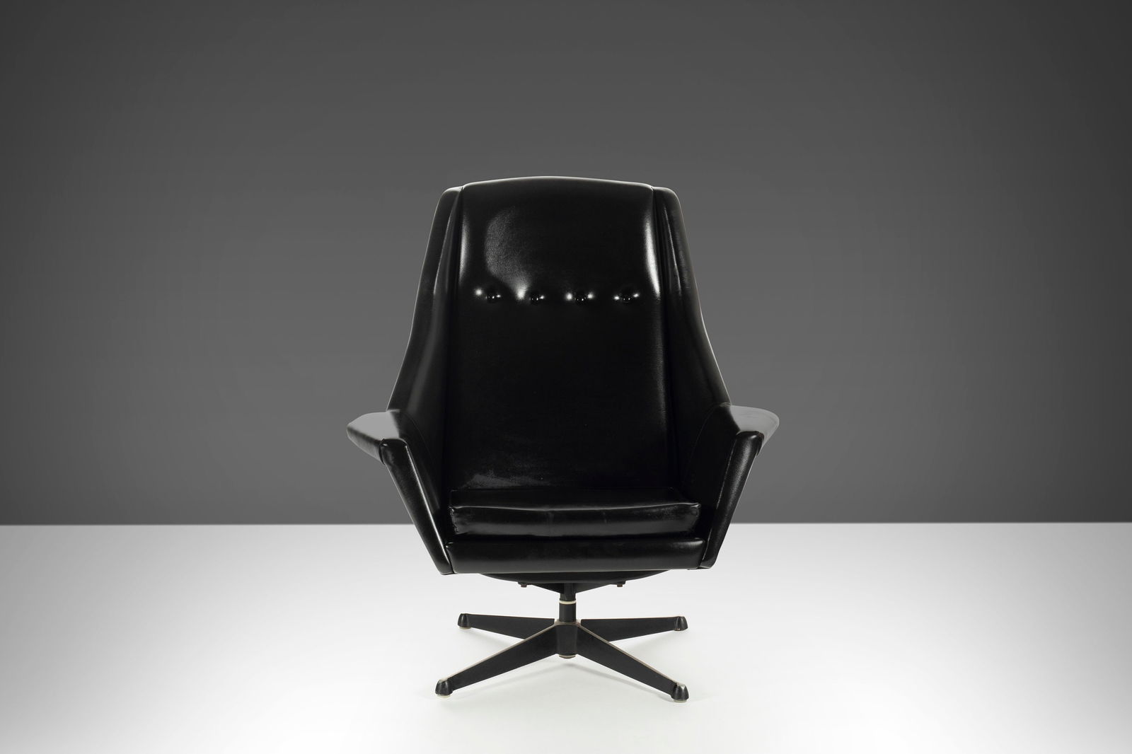 Swedish Mid Century Modern High Back Swivel Lounge Chair Vinyl Steel Base: Swedish Mid Century Modern High Back Swivel Lounge Chair Vinyl Steel Base Discover the elegance of this Mid Century Modern High Back Swivel Lounge Chair from Sweden, featuring a stylish design on a sw