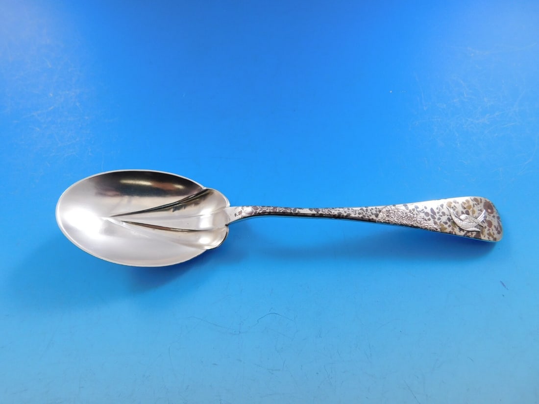 Gorham Cairo Sterling Silver Sugar Spoon Aesthetic Bird 6 1/4": Gorham Cairo Sterling Silver Sugar Spoon Aesthetic Bird 6 1/4" This exquisite sugar spoon, part of the Cairo pattern by Gorham, showcases the Aesthetic Movement style with a stunning applied bird in f