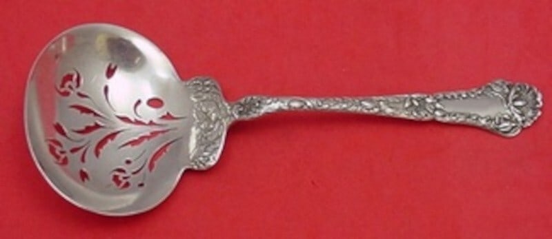 Gorham Poppy Sterling Silver Slotted Spoon 8 3/8" Pierced Design: Gorham Poppy Sterling Silver Slotted Spoon 8 3/8" Pierced Design Elevate your table setting with this exquisite Poppy by Gorham sterling silver slotted spoon. Measuring 8 3/8" in length, this piece fe