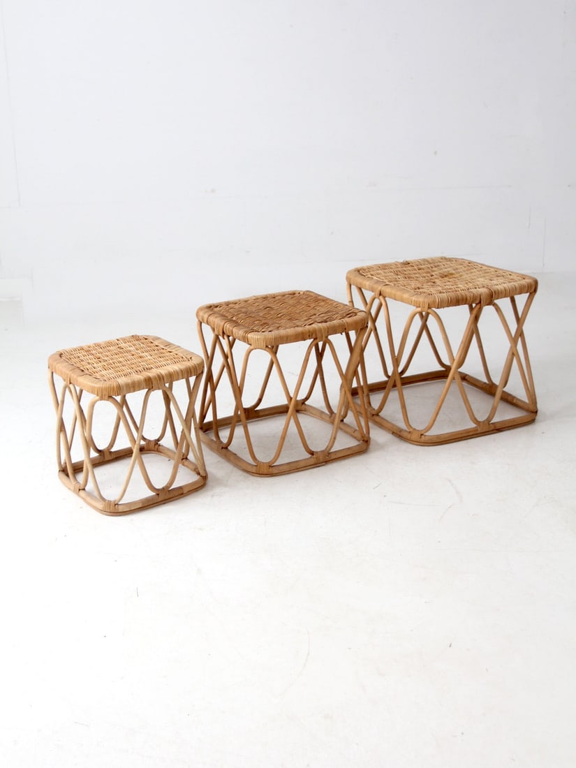 Vintage Rattan Nesting Tables Set of 3 Boho Accent Tables: Vintage Rattan Nesting Tables Set of 3 Boho Accent Tables This charming set of three vintage rattan nesting tables showcases a natural woven rattan design, featuring square tops and open geometric bas