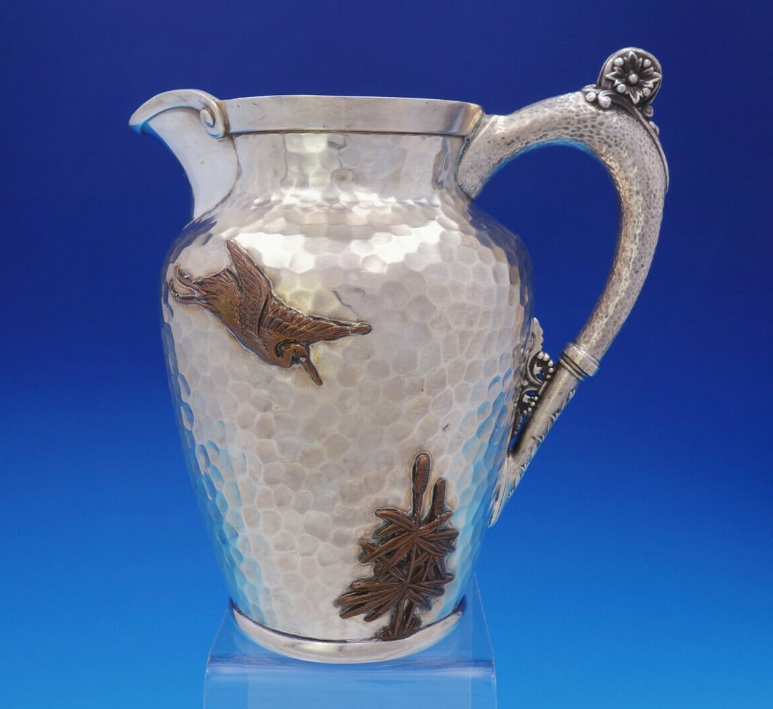 Gorham Applied Metals Sterling Silver Copper Water Pitcher Aesthetic Movement: Gorham Applied Metals Sterling Silver Copper Water Pitcher Aesthetic Movement Experience the elegance of the Aesthetic Movement with this stunning hammered water pitcher by Gorham, crafted between 185
