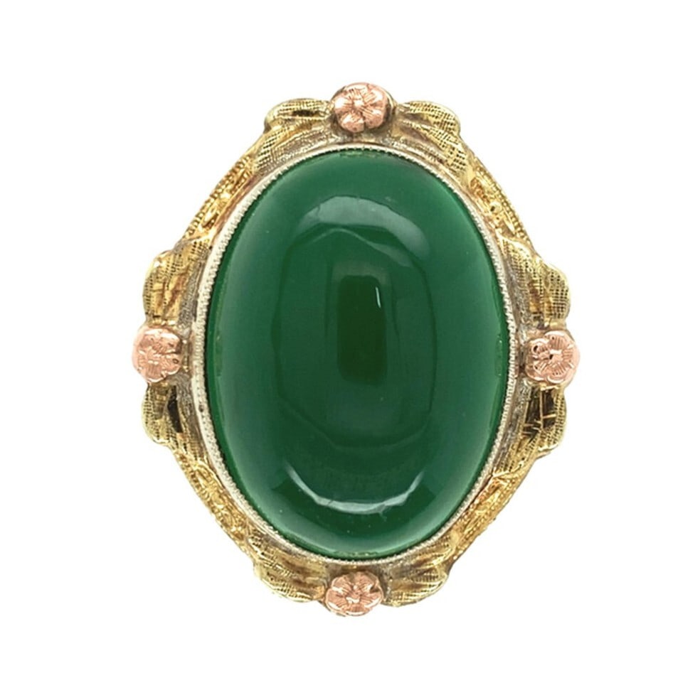 Vintage 14k Gold Onyx Ring with Rose Gold Flowers 1930s: Vintage 14k Gold Onyx Ring with Rose Gold Flowers 1930s This exquisite ring showcases a stunning 14k yellow gold setting adorned with applied rose gold flowers. At its center lies a large cabochon cut