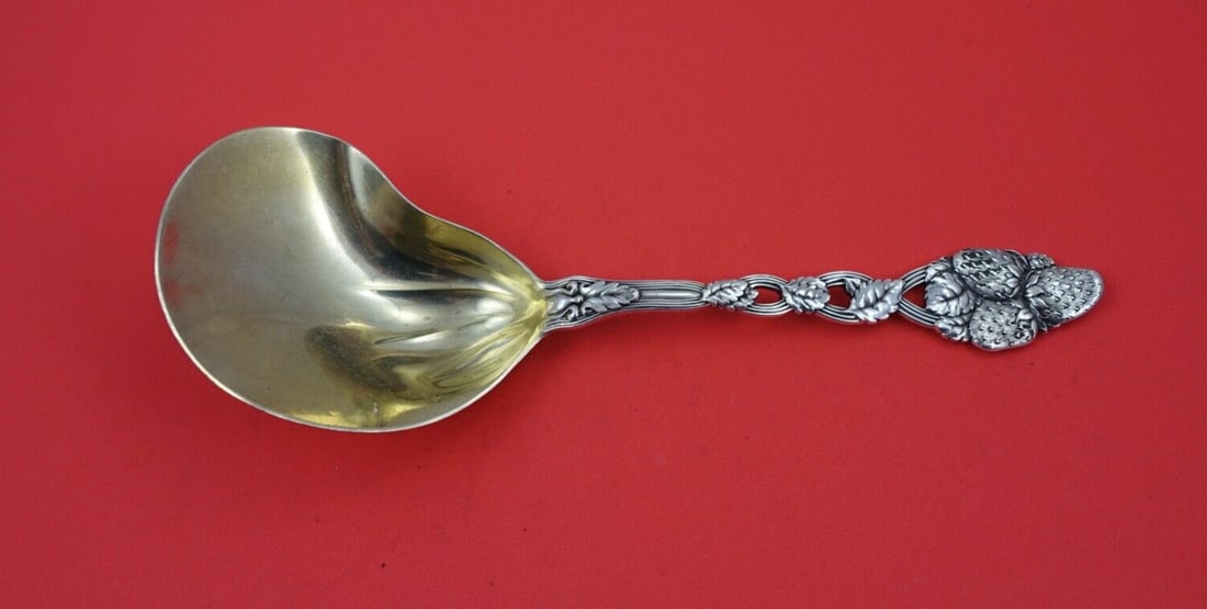Tiffany & Co. Strawberry Vine Sterling Silver Berry Spoon 9.5": Tiffany & Co. Strawberry Vine Sterling Silver Berry Spoon 9.5" This exquisite kidney-shaped berry spoon from Tiffany & Co. features the elegant Strawberry Vine pattern. Crafted from high-quality sterl