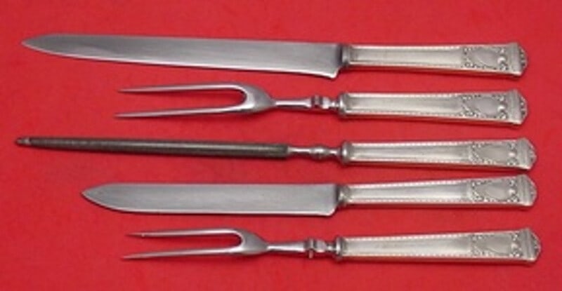 Tiffany & Co San Lorenzo Sterling Silver 5pc Roast Carving Set: Tiffany & Co San Lorenzo Sterling Silver 5pc Roast Carving Set This exquisite 5-piece roast carving set features the San Lorenzo pattern by Tiffany & Co. Crafted from sterling silver with hollow handl
