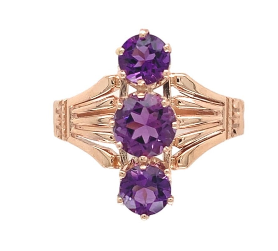 Victorian 10k Rose Gold Three-Stone Amethyst Ring Size 5: Victorian 10k Rose Gold Three-Stone Amethyst Ring Size 5 This exquisite Victorian-style ring showcases a beautiful arrangement of three genuine natural amethyst gemstones set in 10k rose gold. The cen