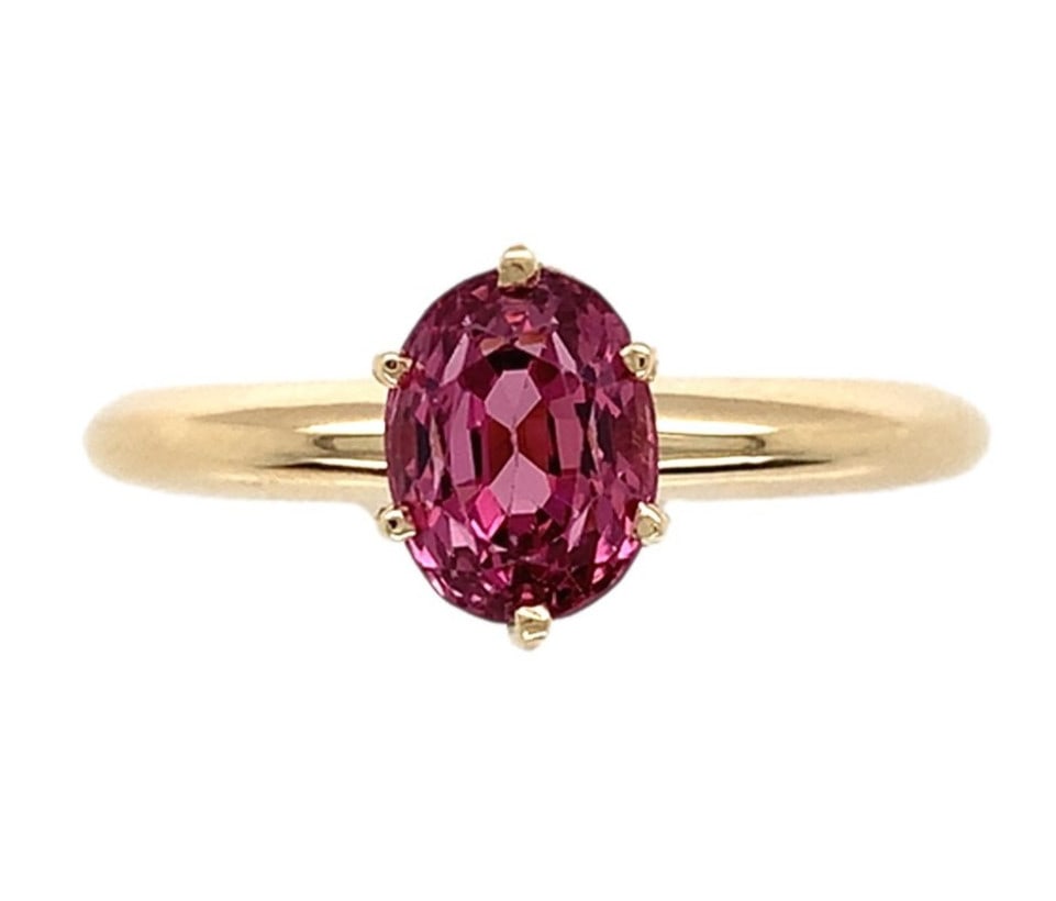 14k Yellow Gold 1.36ct Pink Natural Spinel Solitaire Ring GIA Certified: 14k Yellow Gold 1.36ct Pink Natural Spinel Solitaire Ring GIA Certified This exquisite 14k Yellow Gold Solitaire Ring features a stunning genuine natural pink spinel, elegantly set to showcase its bea